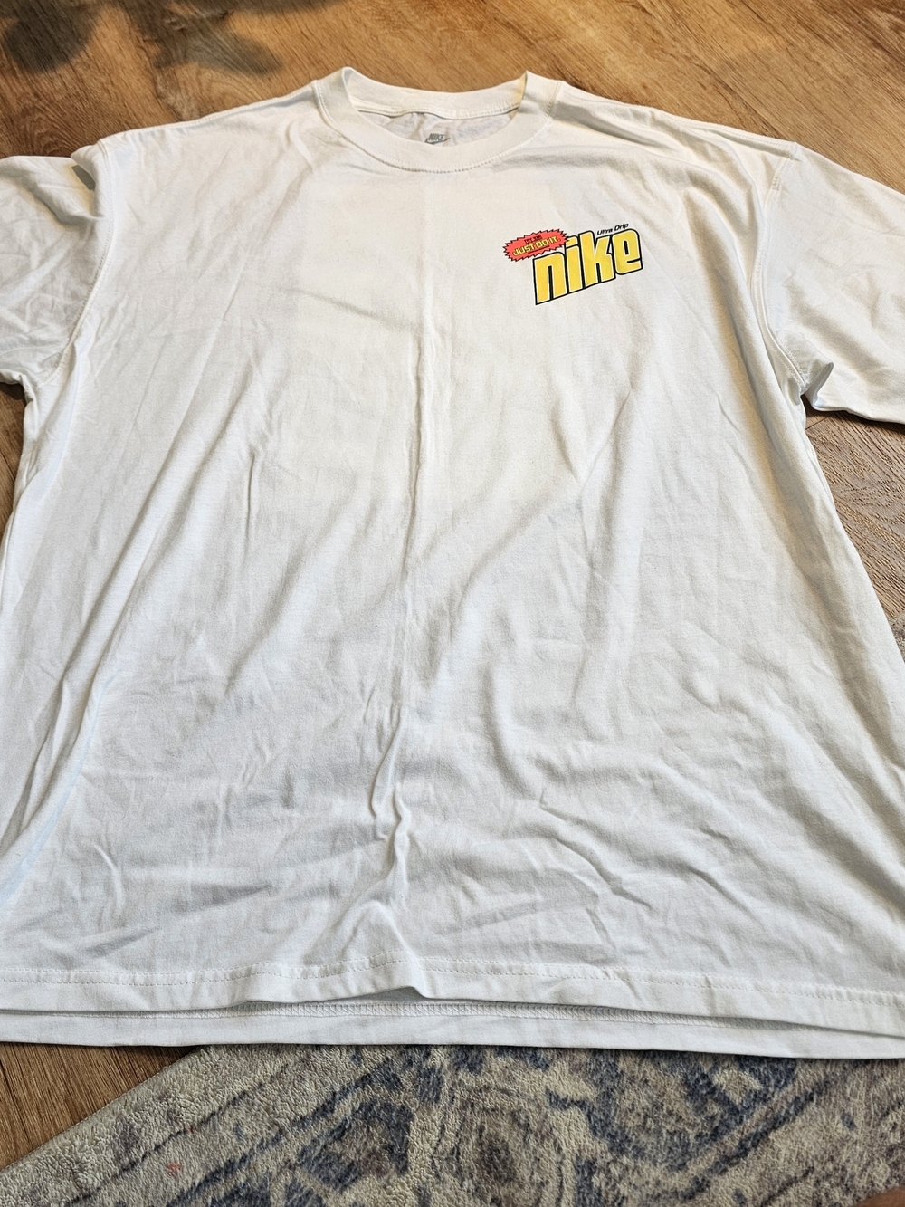 Nike White Short Sleeve Tee with Yellow & Red Logo